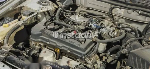 نيسان صنى 2003 فضي مستعملة للبيع - 1