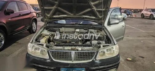 نيسان صنى 2003 فضي مستعملة للبيع - 2