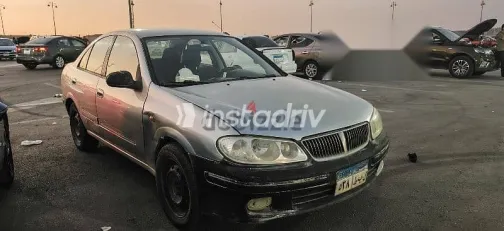 نيسان صنى 2003 فضي مستعملة للبيع - 3