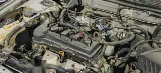 نيسان صنى 2003 فضي مستعملة للبيع