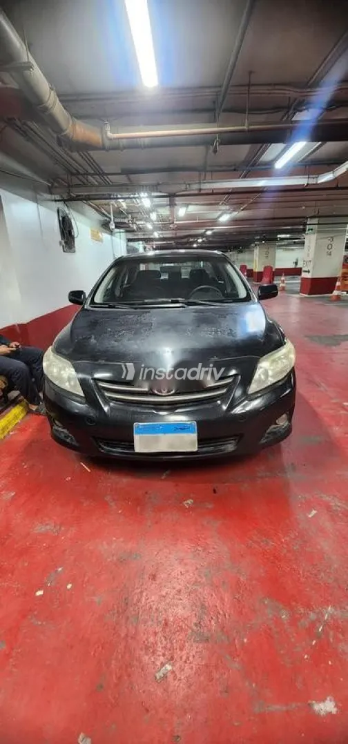 تويوتا كورولا 2009 أسود مستعملة للبيع - 1