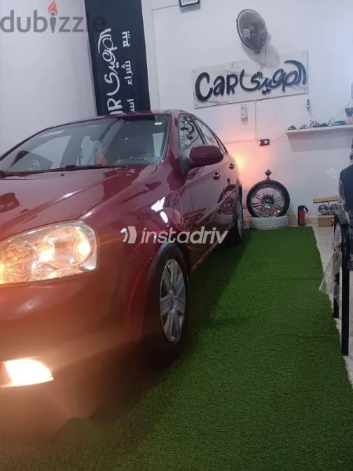 شيفروليه أوبترا 2012 بني مستعملة للبيع - 3