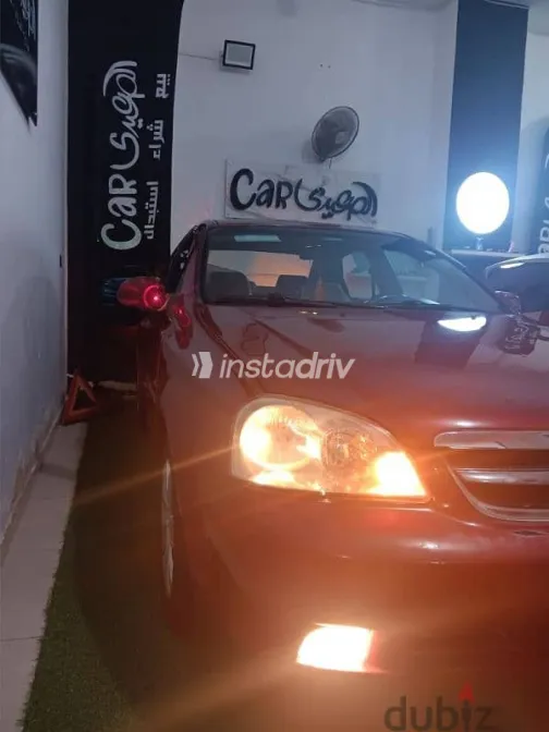 شيفروليه أوبترا 2012 بني مستعملة للبيع - 6