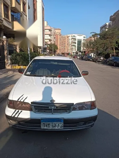 نيسان صنى 1999 أبيض مستعملة للبيع - 1