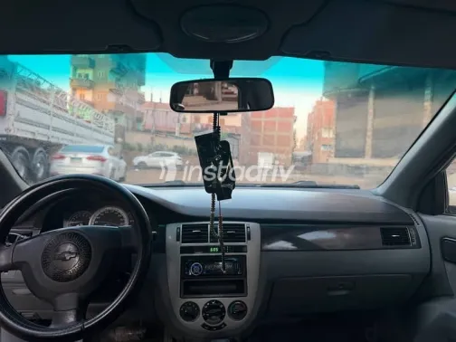 شيفروليه أوبترا 2009 ذهبي مستعملة للبيع - 7