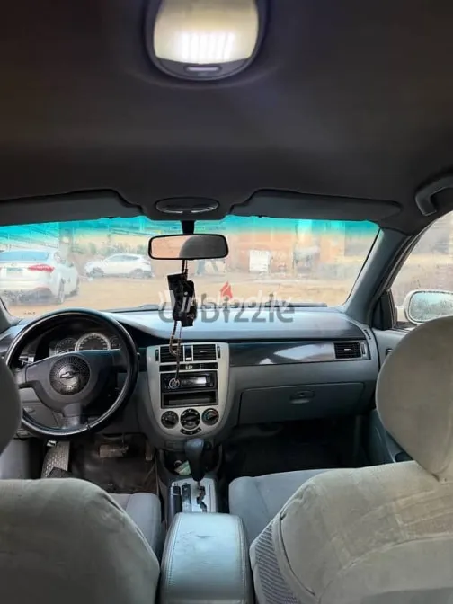 شيفروليه أوبترا 2009 ذهبي مستعملة للبيع - 8