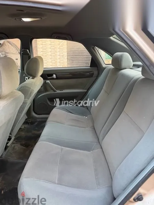 شيفروليه أوبترا 2009 ذهبي مستعملة للبيع - 10