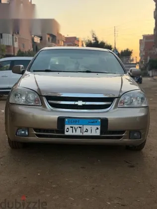 شيفروليه أوبترا 2009 ذهبي مستعملة للبيع