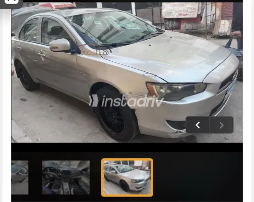 ميتسوبيشي لانسر اى اكس شارك 2015 فضي مستعملة للبيع - 1