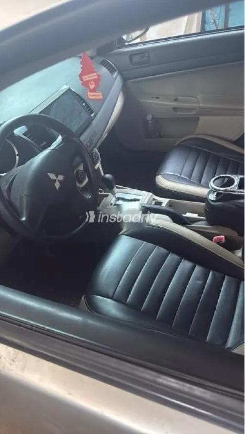 ميتسوبيشي لانسر اى اكس شارك 2015 فضي مستعملة للبيع - 2