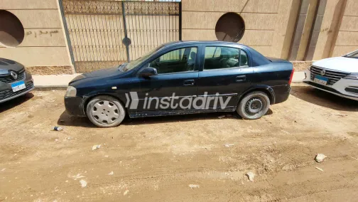 اوبل أسترا 2004 أبيض مستعملة للبيع - 6