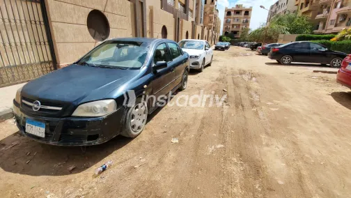 اوبل أسترا 2004 أبيض مستعملة للبيع - 7