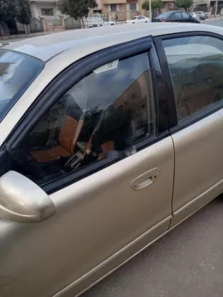 دايو نوبيرا 1999 ذهبي مستعملة للبيع