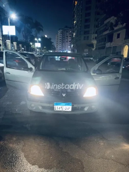 رينو لوجان 2009 ذهبي مستعملة للبيع - 1