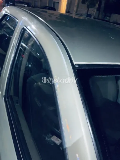 رينو لوجان 2009 ذهبي مستعملة للبيع - 10