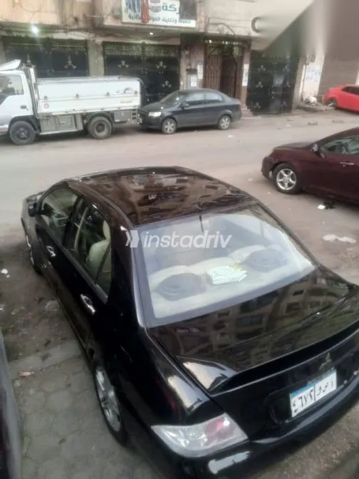 ميتسوبيشي لانسر 2007 أسود مستعملة للبيع - 1