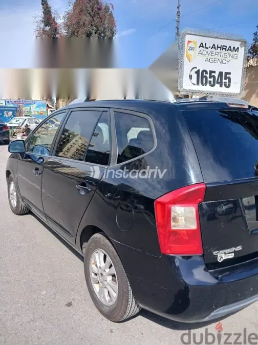 كيا كارينز 2012 أسود مستعملة للبيع - 3