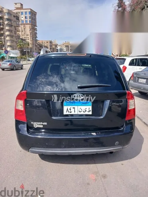 كيا كارينز 2012 أسود مستعملة للبيع - 6