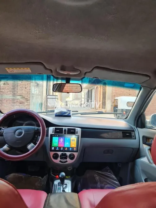 شيفروليه أوبترا 2009 ذهبي مستعملة للبيع - 7