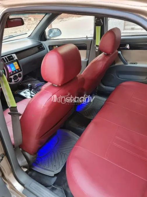 شيفروليه أوبترا 2009 ذهبي مستعملة للبيع - 8