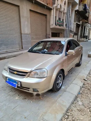 شيفروليه أوبترا 2009 ذهبي مستعملة للبيع