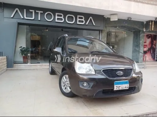 كيا كارينز 2011 بني مستعملة للبيع - 1