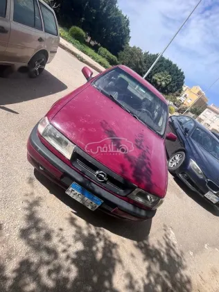 اوبل فيكترا 1994 أحمر غامق مستعملة للبيع