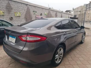 فورد فيوجن 2015 أبيض مستعملة للبيع