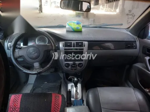 شيفروليه أوبترا 2010 أزرق غامق مستعملة للبيع - 6