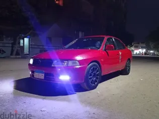 ميتسوبيشي لانسر 1999 أحمر مستعملة للبيع