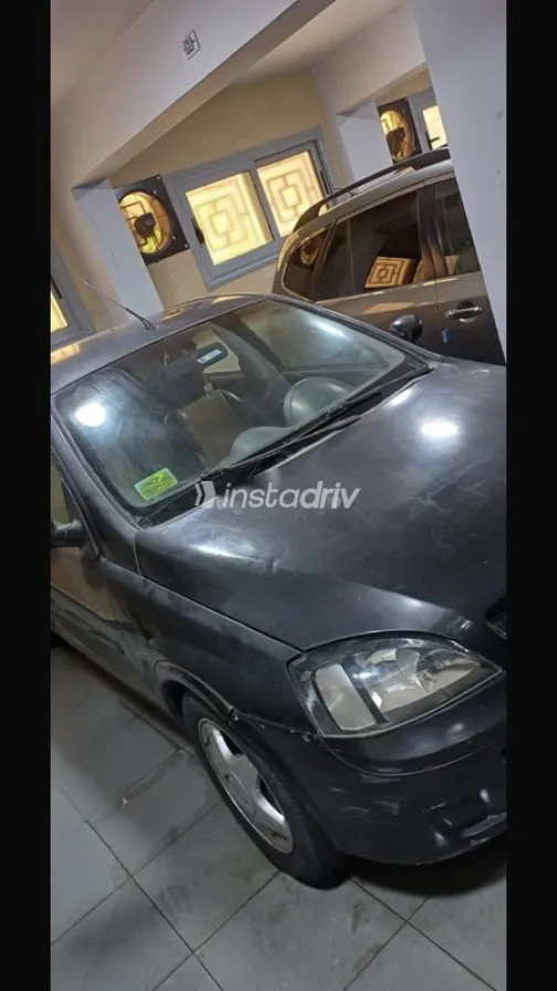 اوبل كورسا 2005 أسود مستعملة للبيع - 2