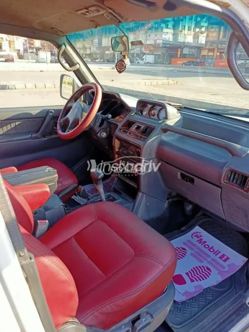 ميتسوبيشي باجيرو 1999 أبيض مستعملة للبيع - 7