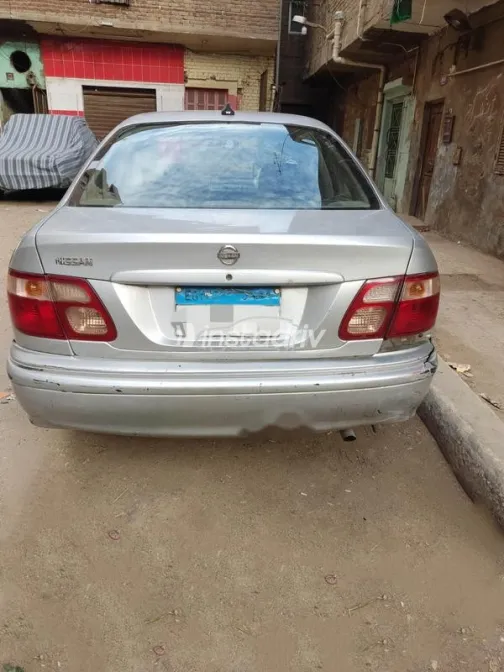 نيسان صنى 2001 رمادي مستعملة للبيع - 2