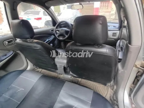 نيسان صنى 2001 رمادي مستعملة للبيع - 5