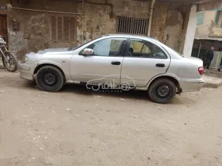 نيسان صنى 2001 رمادي مستعملة للبيع
