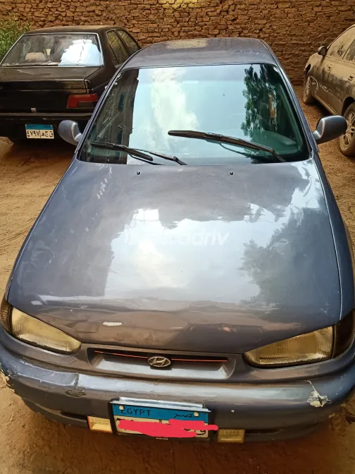 هيونداي إلنترا 1994 أبيض مستعملة للبيع - 1