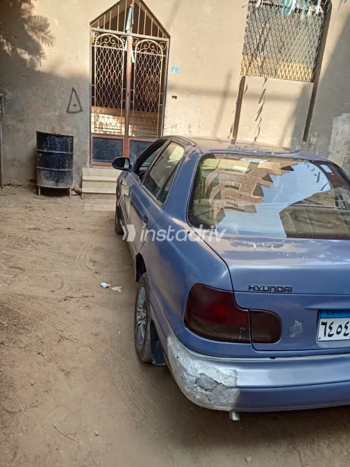 هيونداي إلنترا 1994 أبيض مستعملة للبيع - 3