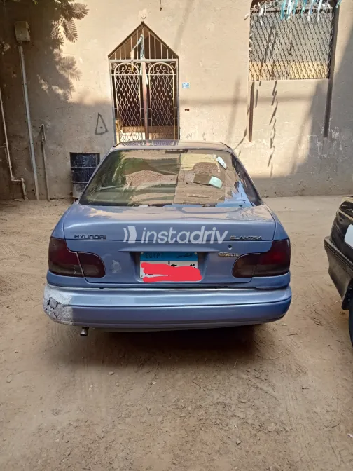 هيونداي إلنترا 1994 أبيض مستعملة للبيع - 6