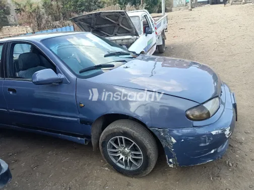 هيونداي إلنترا 1994 أبيض مستعملة للبيع - 10