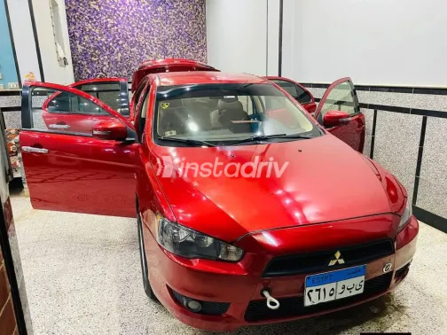 ميتسوبيشي لانسر اى اكس شارك 2015 أحمر مستعملة للبيع - 2