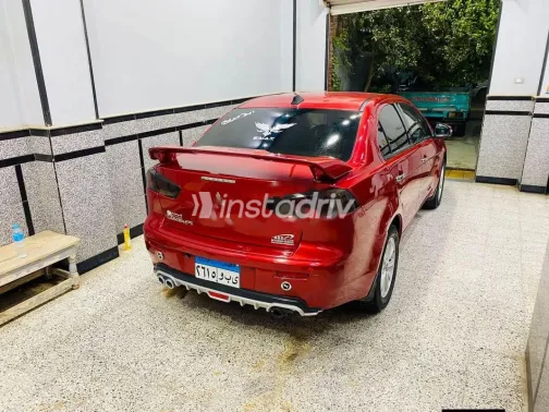 ميتسوبيشي لانسر اى اكس شارك 2015 أحمر مستعملة للبيع - 3