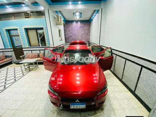 ميتسوبيشي لانسر اى اكس شارك 2015 أحمر مستعملة للبيع - 4