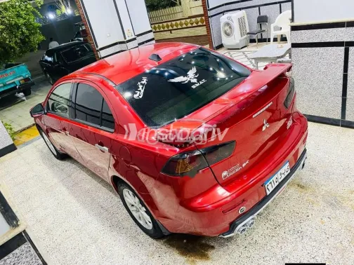 ميتسوبيشي لانسر اى اكس شارك 2015 أحمر مستعملة للبيع - 5