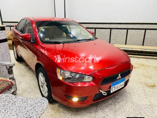 ميتسوبيشي لانسر اى اكس شارك 2015 أحمر مستعملة للبيع - 6