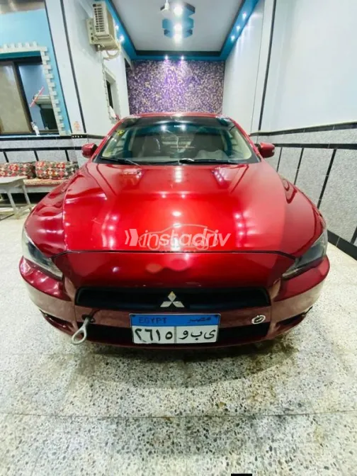 ميتسوبيشي لانسر اى اكس شارك 2015 أحمر مستعملة للبيع - 10