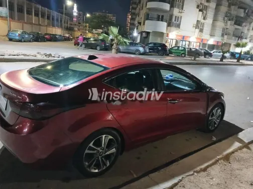 هيونداي إلنترا ام دى 2012 أحمر غامق مستعملة للبيع - 1