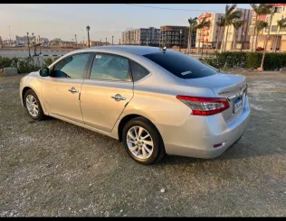 نيسان سنترا 2016 أبيض مستعملة للبيع