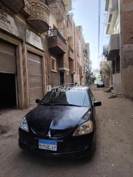 ميتسوبيشي لانسر بومة 2004 أسود مستعملة للبيع - 3