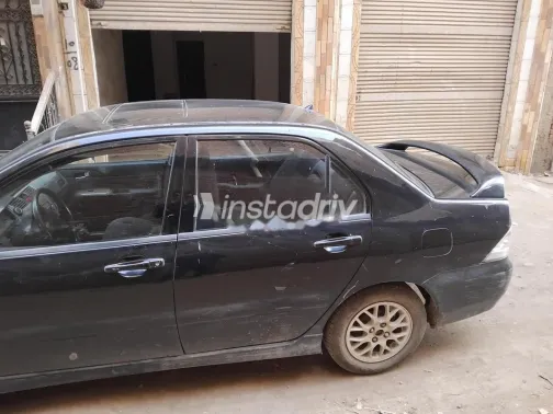 ميتسوبيشي لانسر بومة 2004 أسود مستعملة للبيع - 4