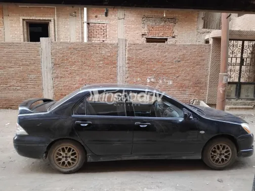 ميتسوبيشي لانسر بومة 2004 أسود مستعملة للبيع - 7